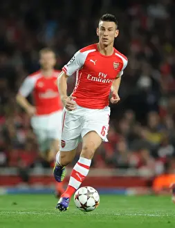 Arsenal V Besiktas 2014/15 Prints: Laurent Koscielny Focused During Arsenal's UEFA Champions League Clash Against Besiktas (2014)