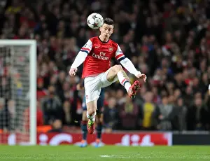 Arsenal V Bayern Munich 2013-14 Prints: Laurent Koscielny Focuses in Arsenal's Champions League Battle against Bayern Munich