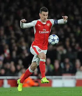 Arsenal V Bayern Munich 2016-17 Prints: Laurent Koscielny Focuses in Arsenal's UEFA Champions League Showdown Against Bayern Munich