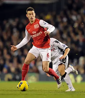 Fulham V Arsenal 2011-12 Prints: Laurent Koscielny Focuses in Fulham vs Arsenal Premier League Clash (2011-12)