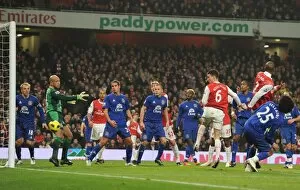 Arsenal v Everton 2010-11 Gallery: Laurent Koscielny heads past Everton goalkeeper Tim Howard to score the 2nd Arsenal goal