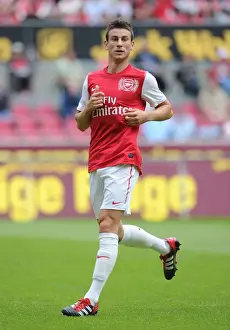 Cologne V Arsenal Prints: Laurent Koscielny Leads Arsenal in Pre-Season Friendly Against Cologne, 2011
