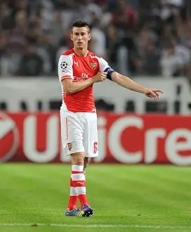 Besiktas V Arsenal 2014-15 Prints: Laurent Koscielny Leads Arsenal in UEFA Champions League Play-Offs against Besiktas (2014)