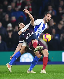 Brighton And Hove Albion V Arsenal 2018-19 Prints: Laurent Koscielny vs Glenn Murray: Intense Battle in Brighton & Hove Albion vs Arsenal FC Premier League Clash