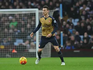 Aston Villa V Arsenal 2015-16 Prints: Laurent Koscielny's Intense Concentration During Aston Villa vs Arsenal Premier League Match