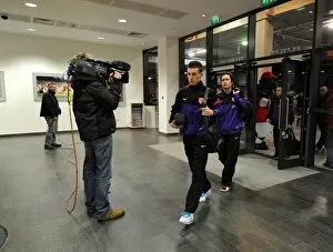 Images Dated 30th January 2013: Laurent Koscileny and Tomas Rosicky (Arsenal) walk into the stadium befor the match