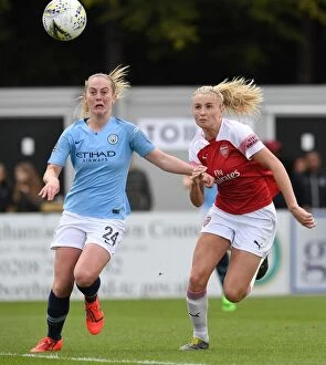 Images Dated 11th May 2019: Leah Williamson vs. Keira Walsh: Intense Rivalry in Arsenal Women vs