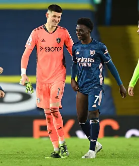 Leeds United vs. Arsenal: Bukayo Saka and Illan Meslier Share a Light-Hearted Moment Amidst Premier League Tension