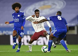 Leicester City v Arsenal Carabao Cup 2020-21 Collection: Leicester City vs. Arsenal: Eddie Nketiah Clashes with Hamza Choudhury