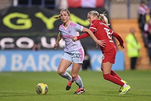 Images Dated 29th January 2024: Lia Waelti vs. Sofie Lundgaard: Intense Battle in Liverpool FC vs