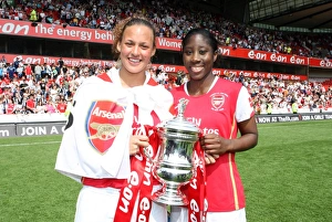 Lianne Sanderson and Anita Asante (Arsenal) with the FA Cup Trophy