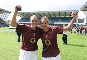 Lianne Sanderson and Julie Fleeting (Arsenal) with the FA Cup Trophy