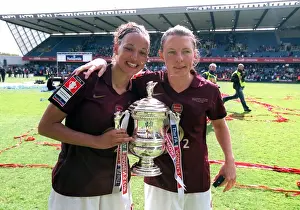 Lianne Sanderson and Kirsty Pealling (Arsenal) with the FA Cup Trophy