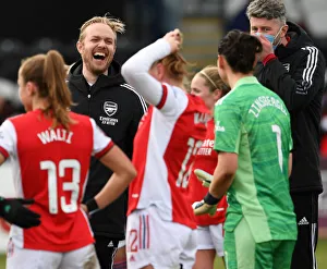 A Light-Hearted Moment: Arsenal's Jonas Eidevall and Manuela Zinsberger Share a Laugh on the Sidelines during Arsenal Women vs Manchester United Women