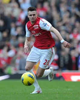 LONDON, ENGLAND - FEBRUARY 26: Carl Jenkinson of Arsenal during the Barclays Premier League match between Arsenal and Tottenham Hotspur at Emirates Stadium on February 26, 2012 in London, England. (Photo by Stuart MacFarlane / Arsenal FC via