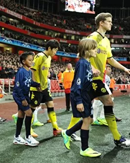 LONDON, ENGLAND - NOVEMBER 23: Player escorts before the UEFA Champions League Group F match between Arsenal FC