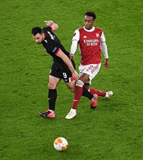 Images Dated 29th October 2020: LONDON, ENGLAND - OCTOBER 29: Joe Willock of Arsenal challenges Patrick Hoban of Dundalk during