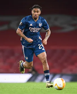 Lone Star Nelson Shines in Empty Emirates: Arsenal vs. Rapid Wien, UEFA Europa League Amid Pandemic