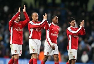 (L>R) Fran Merida, Mikael Silvestre, Sanchez Watt and Carlos Vela (Arsenal) clap the fans after the match