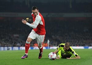 Images Dated 25th October 2016: Lucas Perez Scores Against Joey van den Berg: Arsenal's 2-0 Victory Over Reading in EFL Cup