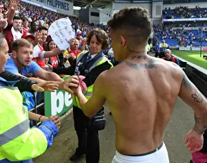 Lucas Torreira's Heartfelt Gesture: Arsenal Star Gives Shirt to Ecstatic Fan at Cardiff City