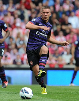 Stoke City V Arsenal 2012-13 Prints: Lukas Podolski in Action: Arsenal vs. Stoke City, Premier League 2012-13