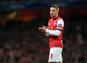 Arsenal V Montpellier 2012-13 Prints: Lukas Podolski in Action: Arsenal vs Montpellier, UEFA Champions League, 2012
