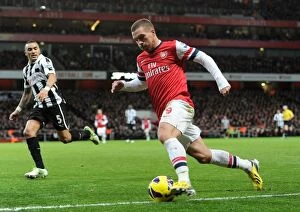Arsenal v Newcastle United 2012-13 Collection: Lukas Podolski in Action: Arsenal vs Newcastle United, Premier League 2012-13