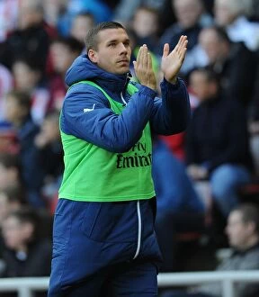 Sunderland v Arsenal 2014/15 Collection: Lukas Podolski in Action: Sunderland vs Arsenal, Premier League 2014/15