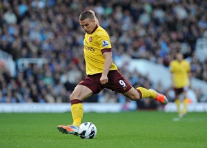 West Ham United V Arsenal 2012-13 Prints: Lukas Podolski: In Action Against West Ham United for Arsenal, Premier League 2012-13