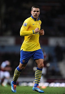West Ham United V Arsenal 2013-14 Prints: Lukas Podolski in Action: West Ham United vs. Arsenal, Premier League 2013-14