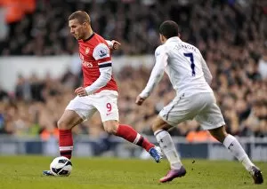 Images Dated 3rd March 2013: Lukas Podolski (Arsenal) Aaron Lennon (Tottenham). Tottenham Hotspur 2: 1 Arsenal