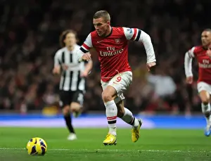 Arsenal V Newcastle United 2012-13 Prints: Lukas Podolski (Arsenal). Arsenal 7: 3 Newcastle United