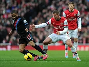 Arsenal v Crystal Palace 2013-14 Gallery: Lukas Podolski (Arsenal) Jason Puncheon (Palace). Arsenal 2: 0 Crystal Palace. Barclays