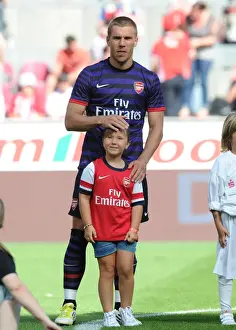 Cologne V Arsenal 2012-13 Prints: Lukas Podolski: Arsenal Star Prepares for Cologne Clash (2012-13)