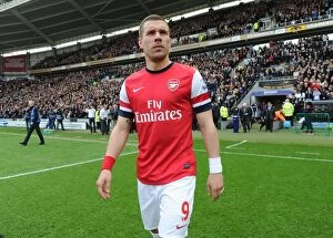 Images Dated 20th April 2014: Lukas Podolski: Arsenal Star's Pre-Match Focus at Hull City, 2014
