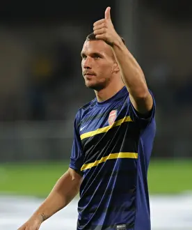 Montpellier V Arsenal 2012-13 Prints: Lukas Podolski: Arsenal Star's Pre-Match Focus at Montpellier