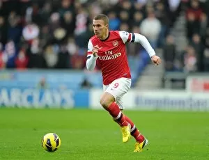 Images Dated 22nd December 2012: Lukas Podolski (Arsenal). Wigan Athletic 0: 1 Arsenal. Barclays Premier League. The DW Stadium