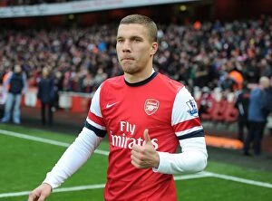 Arsenal v Swansea 2012-13 Collection: Lukas Podolski: Arsenal's Ready-to-Go Striker Against Swansea City (2012-13)