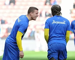 Lukas Podolski and Bacary Sagna (Arsenal). Stoke City 1: 0 Arsenal. Barclays Premier League