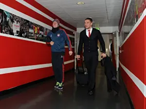 Arsenal V Bayern Munich 2013-14 Prints: Lukas Podolski and Bastian Schweinsteiger: A Football Rivalry Turned Camaraderie at Arsenal v Bayern Munich