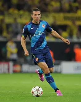 Borussia Dortmund V Arsenal 2014-15 Prints: Lukas Podolski: Battle of the Borussias - Borussia Dortmund vs