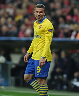 Bayern Munich V Arsenal 2013-14 Prints: Lukas Podolski: Battle in Munich - FC Bayern vs. Arsenal, UEFA Champions League 2014