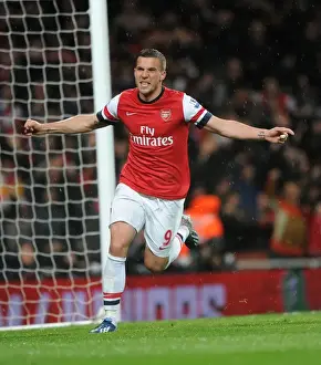 Lukas Podolski celebrates scoring his 2nd goal Arsenals 3rd. Arsenal 4: 1 Wigan Athletic