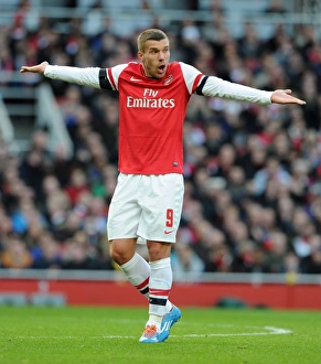 Arsenal V Liverpool - FA Cup 2013-14 Prints: Lukas Podolski in FA Cup Action: Arsenal vs. Liverpool, 2014