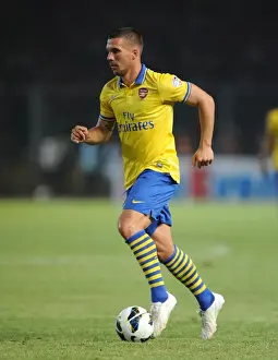 Indonesia Dream Team V Arsenal 2013-14 Prints: Lukas Podolski Faces Indonesia All-Stars: Arsenal Star in Pre-Season Clash, Jakarta 2013