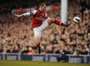 Tottenham Hotspur V Arsenal 2012-13 Prints: Lukas Podolski Faces Off: Tottenham Hotspur vs. Arsenal, Premier League 2012-13