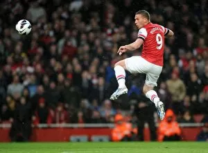 Lukas Podolski scores his 2nd goal Arsenals 3rd. Arsenal 4: 1 Wigan Athletic. Barclays