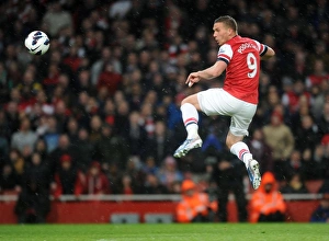 Lukas Podolski scores his 2nd goal Arsenals 3rd. Arsenal 4:1 Wigan Athletic. Barclays Lukas Podolski scores his 2nd goal Arsenals 3rd. Arsenal 4:1 Wigan Athletic. Barclays