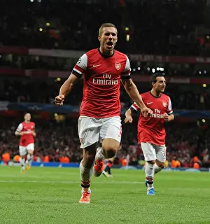 Arsenal V Olympiacos 2012-13 Prints: Lukas Podolski Scores Arsenal's Second Goal Against Olympiacos in the UEFA Champions League